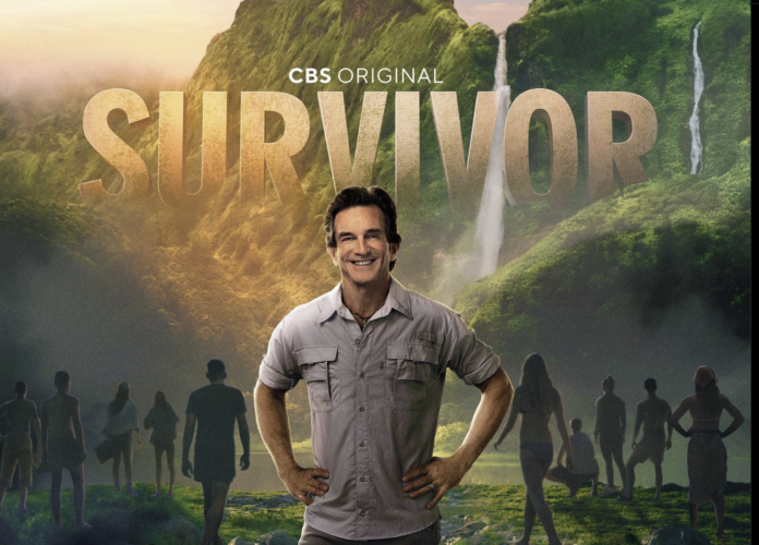 Host Jeff Probst stands confidently in front of a Survivor backdrop. Host Jeff Probst stands confidently in front of a Survivor backdrop.