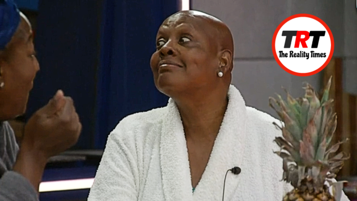 A woman in a white robe looks to the side with a thoughtful expression. A woman in a white robe looks to the side with a thoughtful expression.