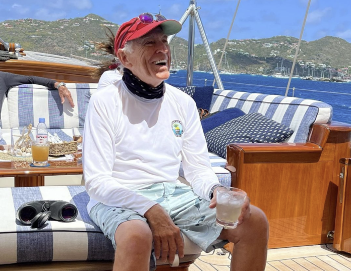 Man in casual wear enjoying a sunny day on a boat. Man in casual wear enjoying a sunny day on a boat.