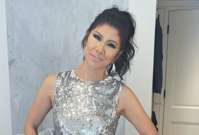Woman in a silver sequined dress smiling. Woman in a silver sequined dress smiling.