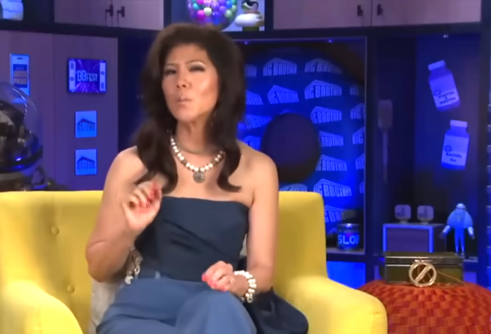 Woman in a strapless top speaking on a colorful TV set. Woman in a strapless top speaking on a colorful TV set.