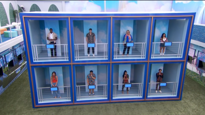 People standing behind glass windows in individual booths. People standing behind glass windows in individual booths.