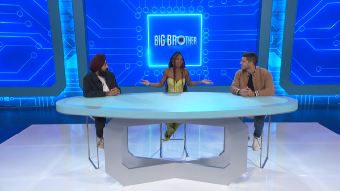 Three hosts engaging in a tech talk show with a 'BIG BROTHER' screen behind. Three hosts engaging in a tech talk show with a 'BIG BROTHER' screen behind.