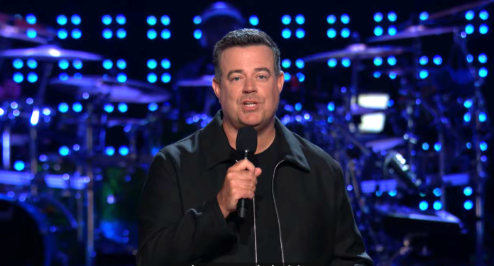 Comedian performing on stage with microphone in hand. Comedian performing on stage with microphone in hand.