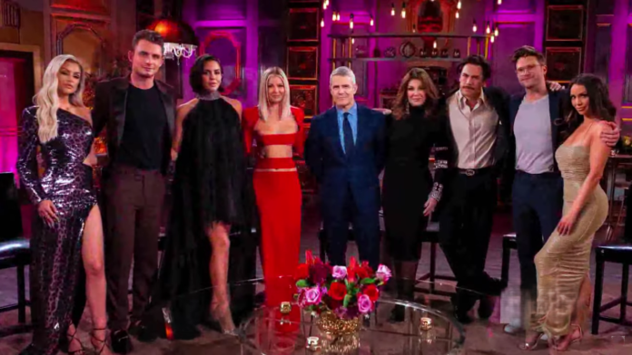 A group of six people dressed elegantly in a stylish lounge setting. A group of six people dressed elegantly in a stylish lounge setting.