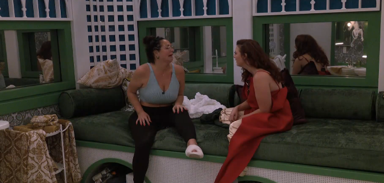 A beach at sunset with vibrant colors and calm waves.