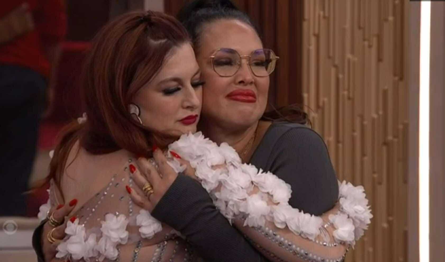 A beach at sunset with vibrant colors and calm waves.