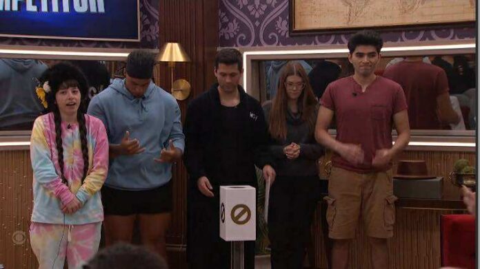 Four people standing and holding hands in a room with patterned purple walls. Four people standing and holding hands in a room with patterned purple walls.