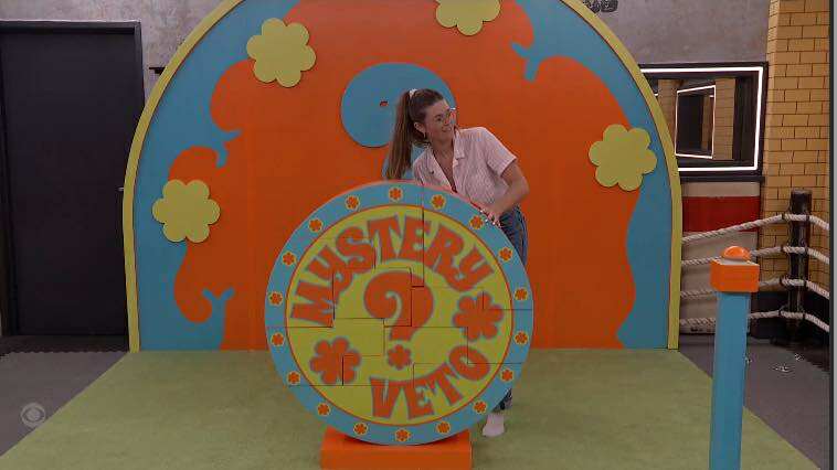 A beach at sunset with vibrant colors and calm waves.