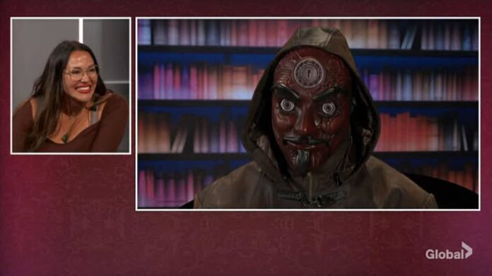 A person in a detailed, eerie mask with a hood in a library setting. A person in a detailed, eerie mask with a hood in a library setting.