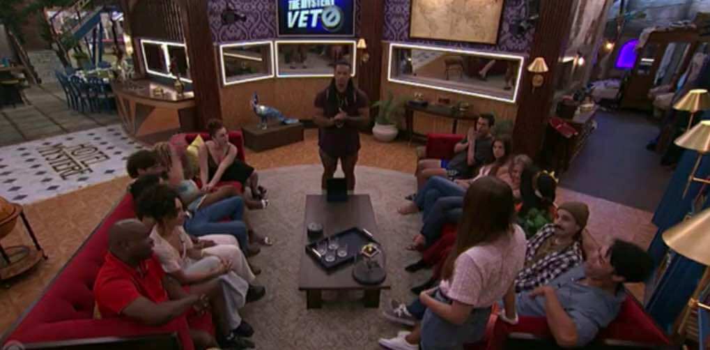 A beach at sunset with vibrant colors and calm waves.