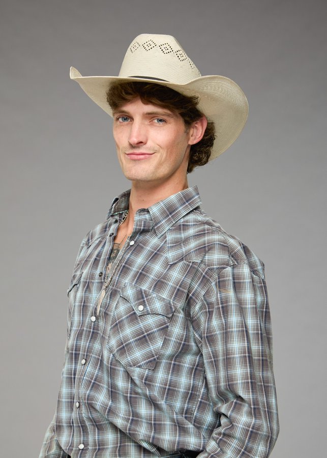 A beach at sunset with vibrant colors and calm waves.