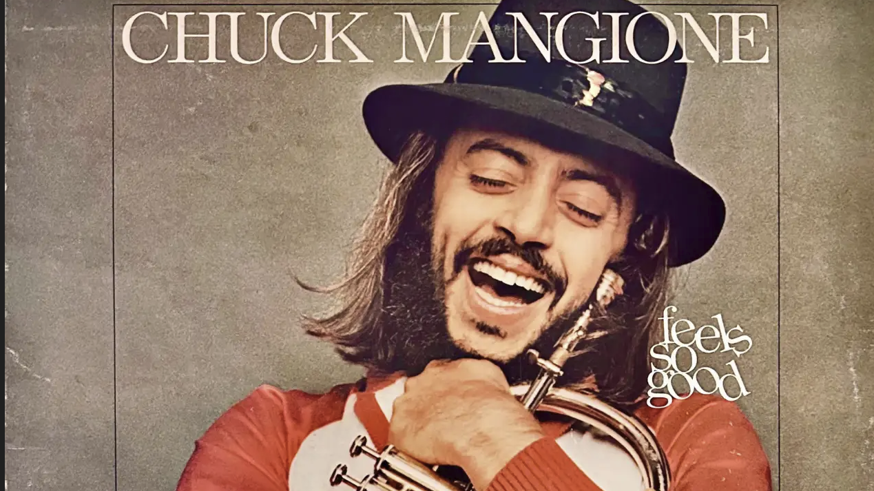 A beach at sunset with vibrant colors and calm waves.