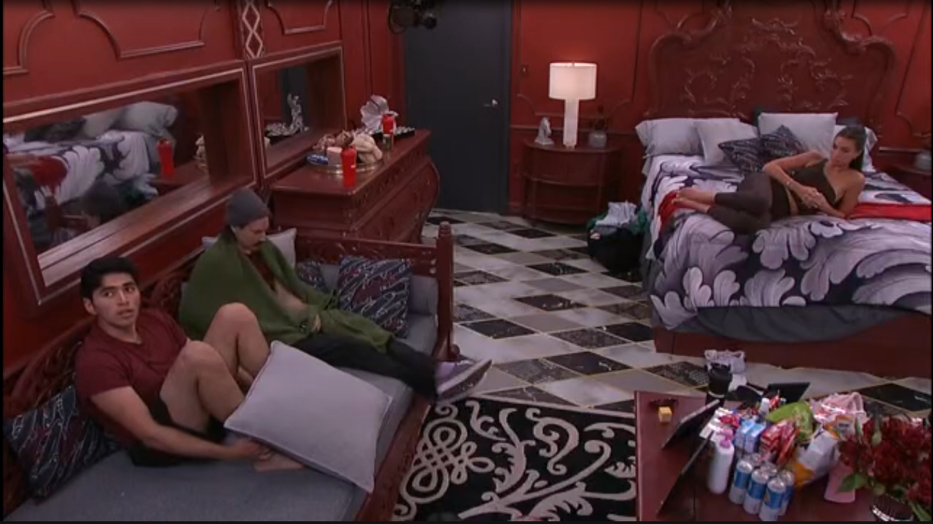 A beach at sunset with vibrant colors and calm waves.