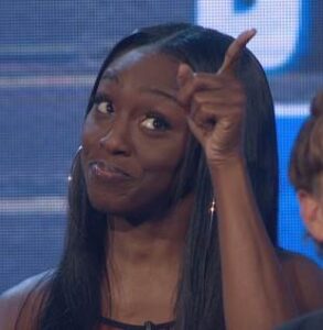 A beach at sunset with vibrant colors and calm waves.
