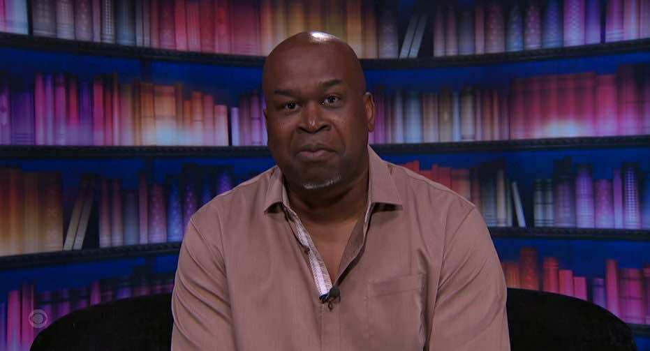 A beach at sunset with vibrant colors and calm waves.