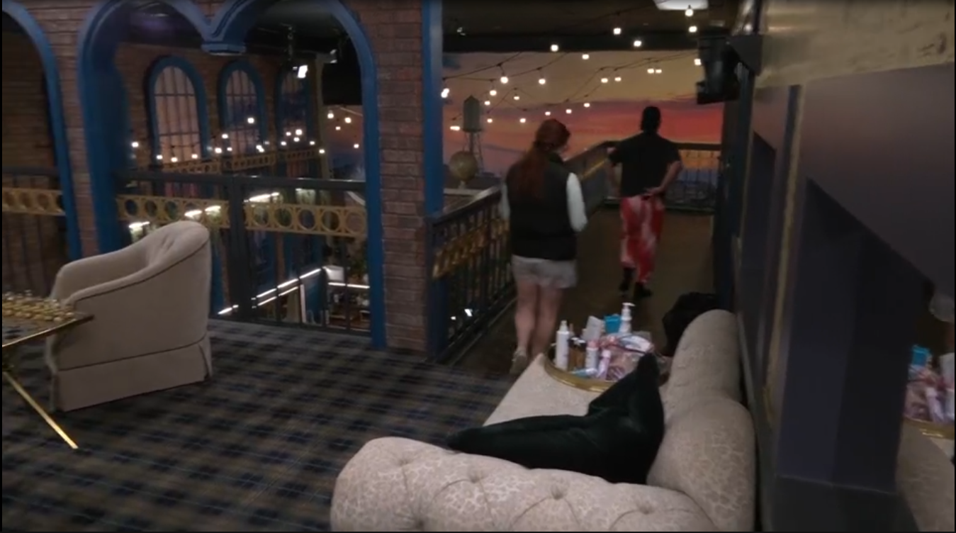 A beach at sunset with vibrant colors and calm waves.