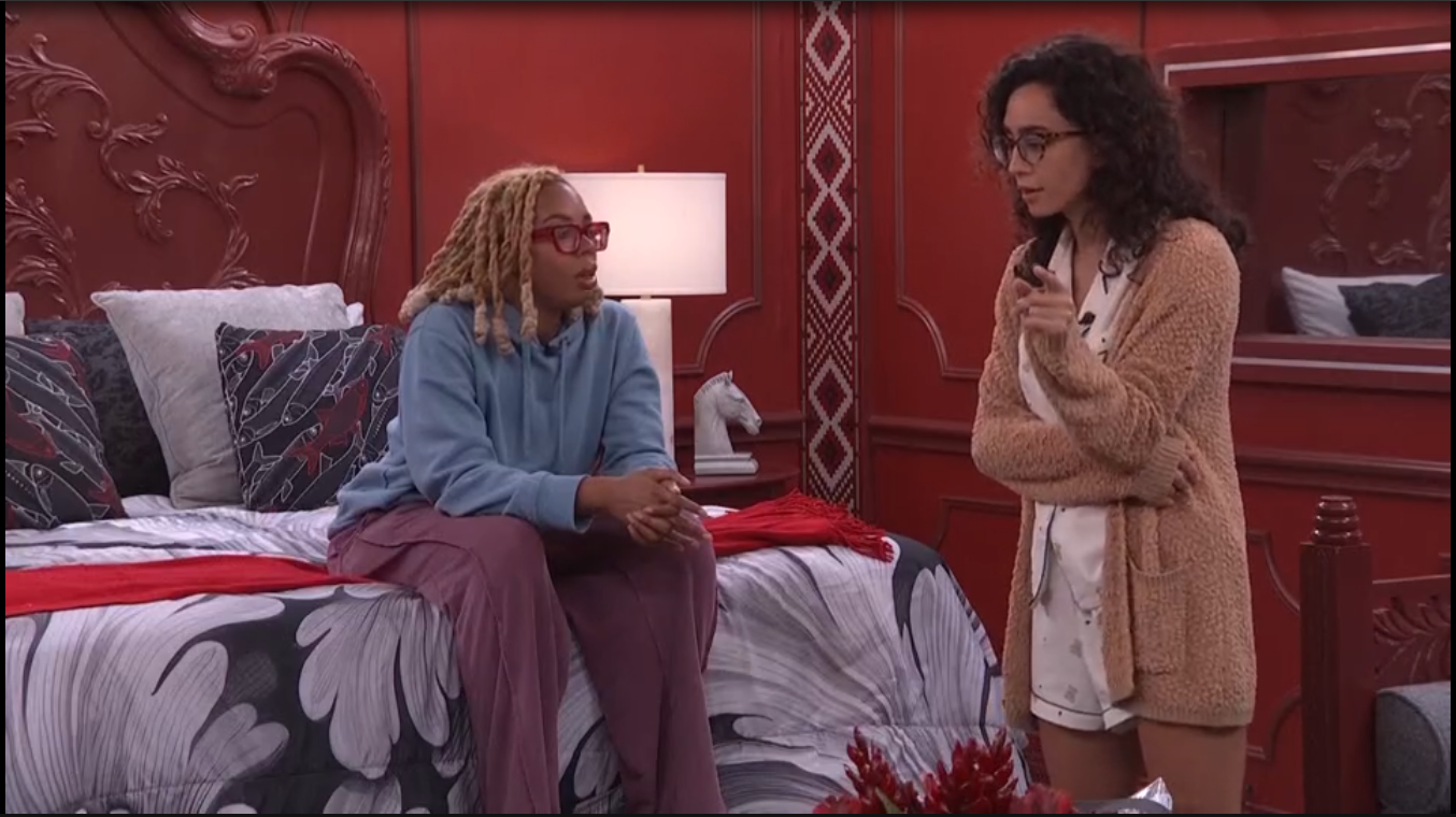 A beach at sunset with vibrant colors and calm waves.