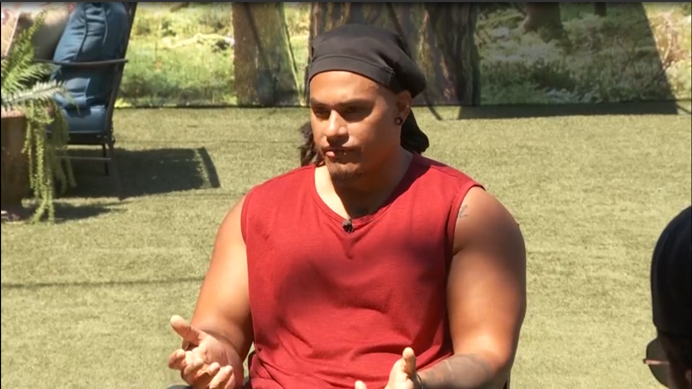 A beach at sunset with vibrant colors and calm waves.