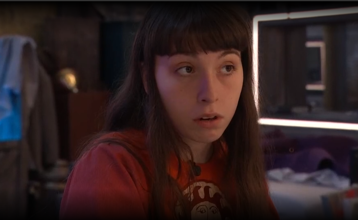 A beach at sunset with vibrant colors and calm waves.