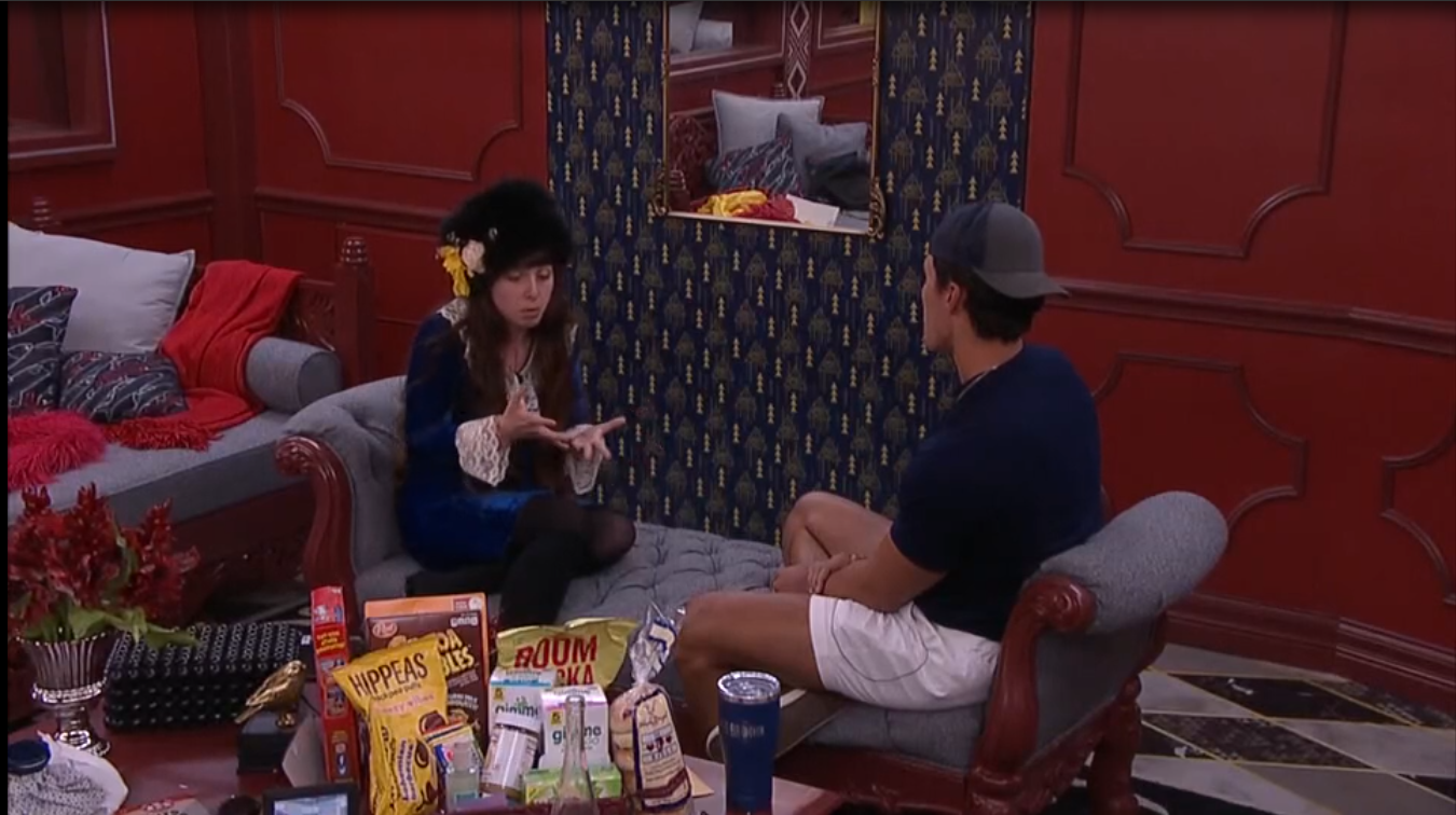 A beach at sunset with vibrant colors and calm waves.