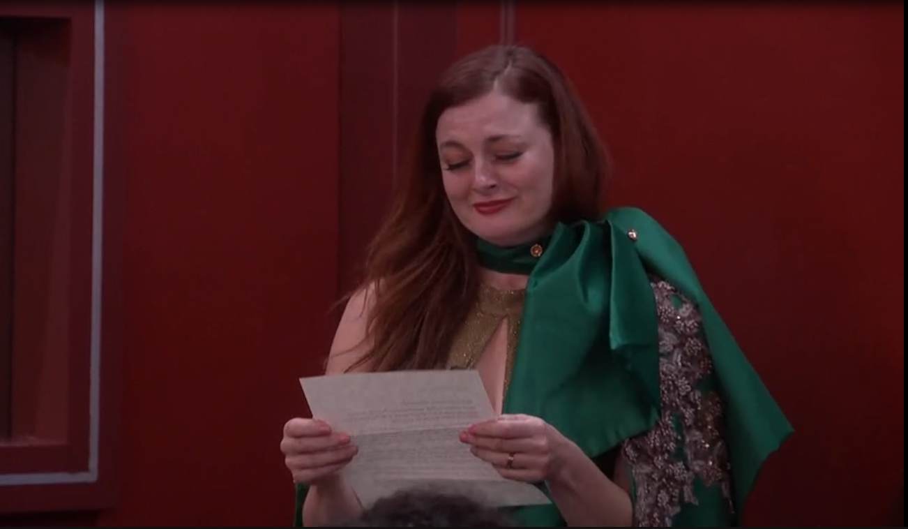 A beach at sunset with vibrant colors and calm waves.