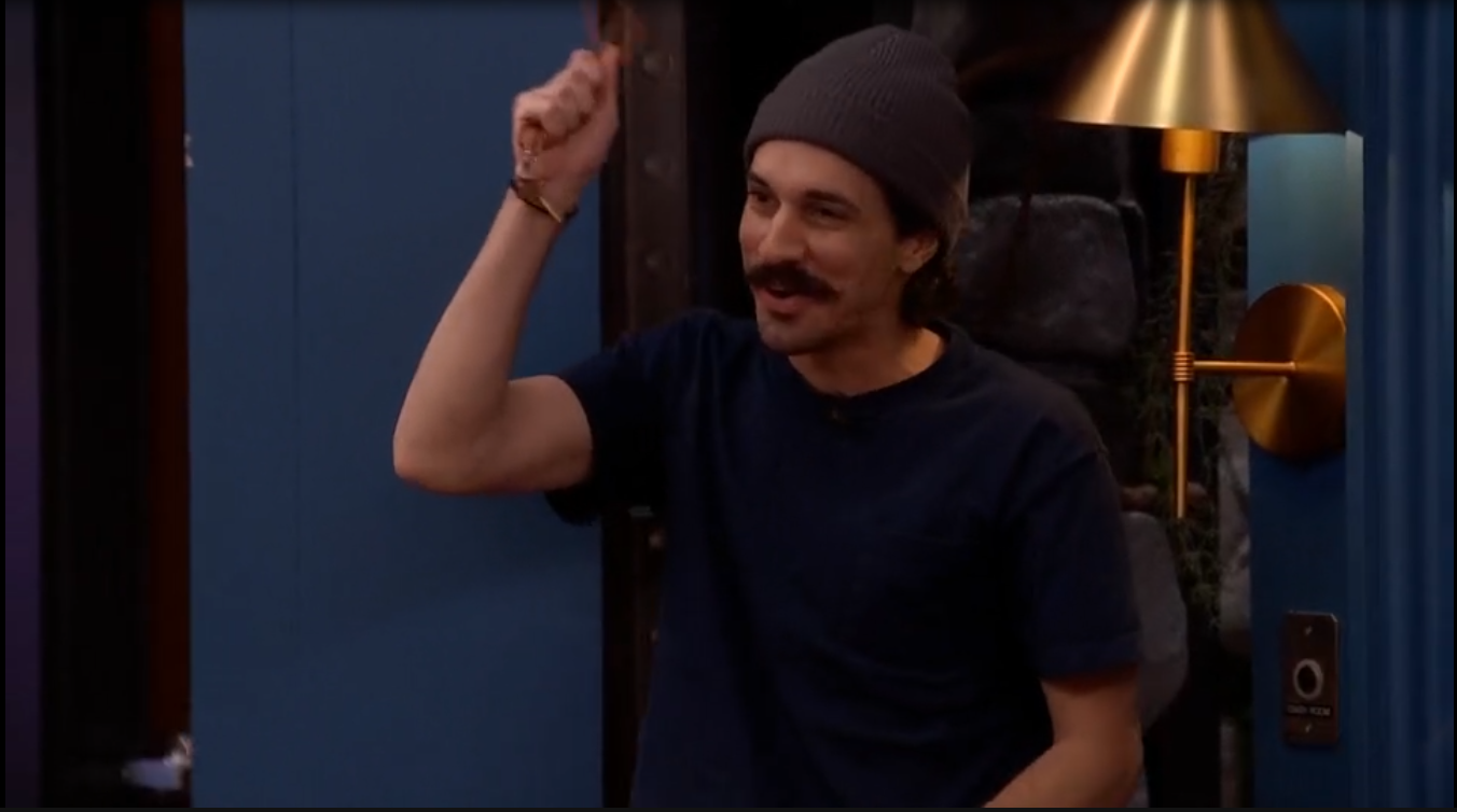 A beach at sunset with vibrant colors and calm waves.