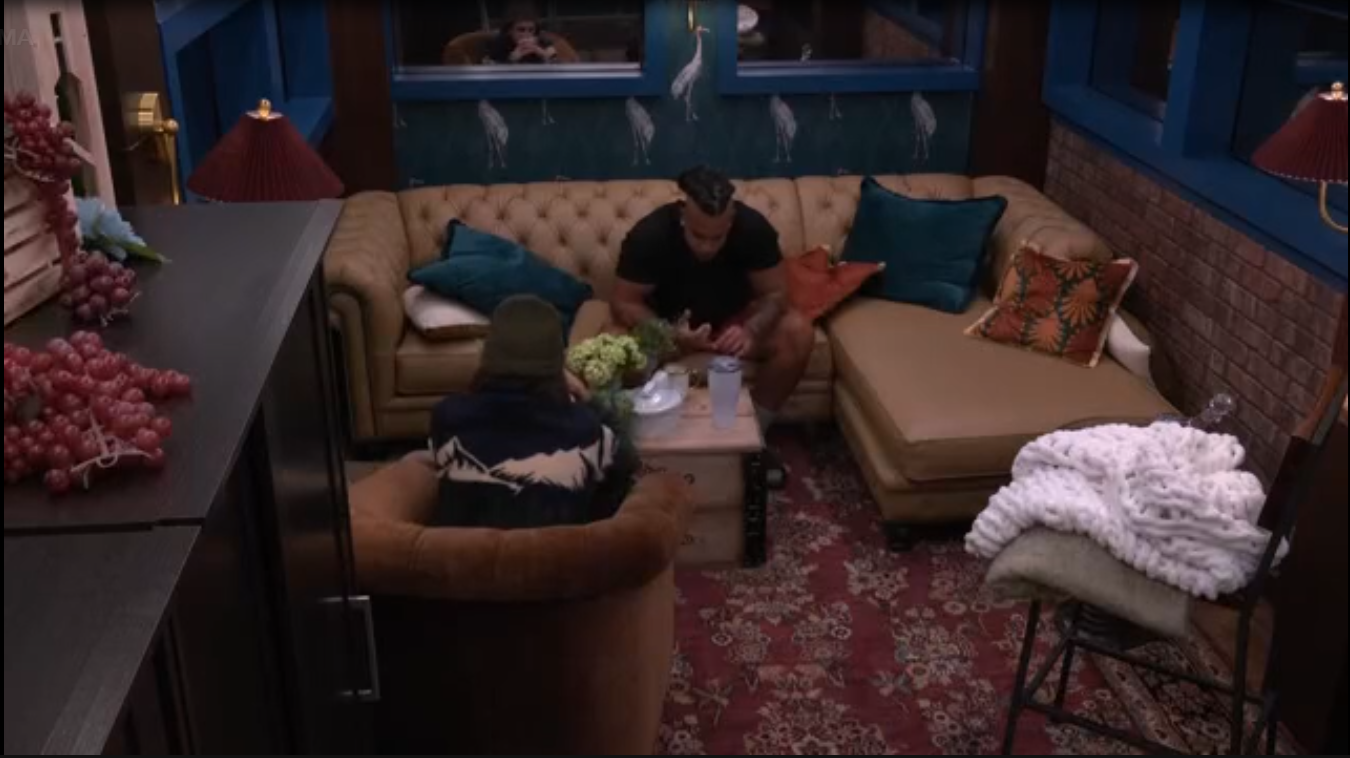 A beach at sunset with vibrant colors and calm waves.