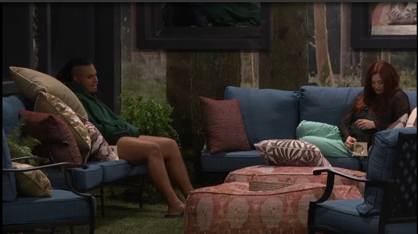 A beach at sunset with vibrant colors and calm waves.