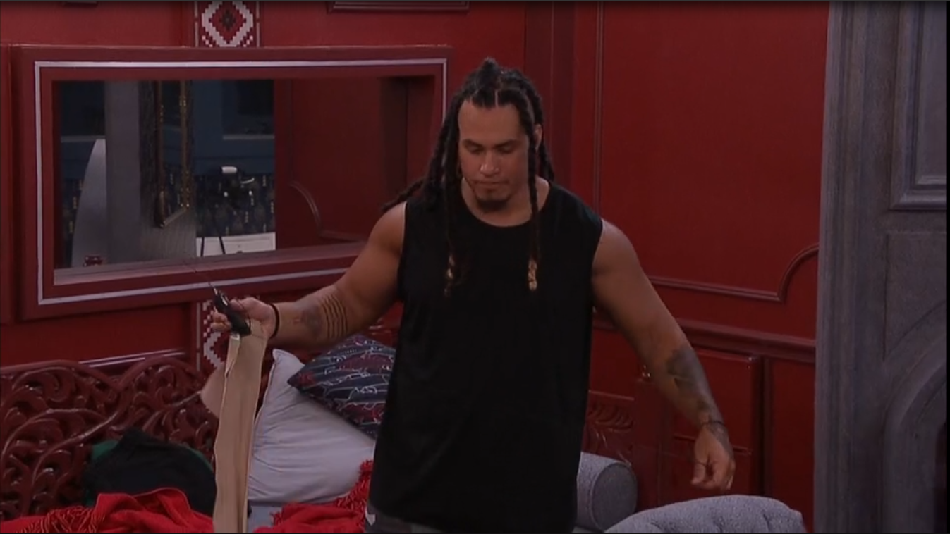 A beach at sunset with vibrant colors and calm waves.