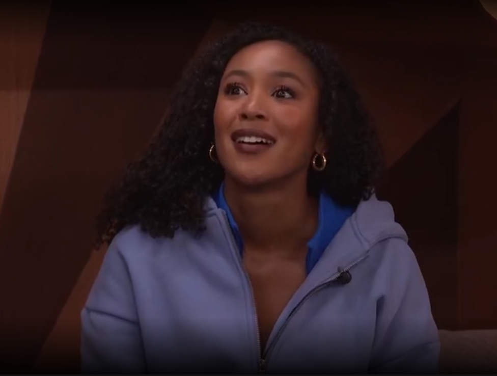 A beach at sunset with vibrant colors and calm waves.