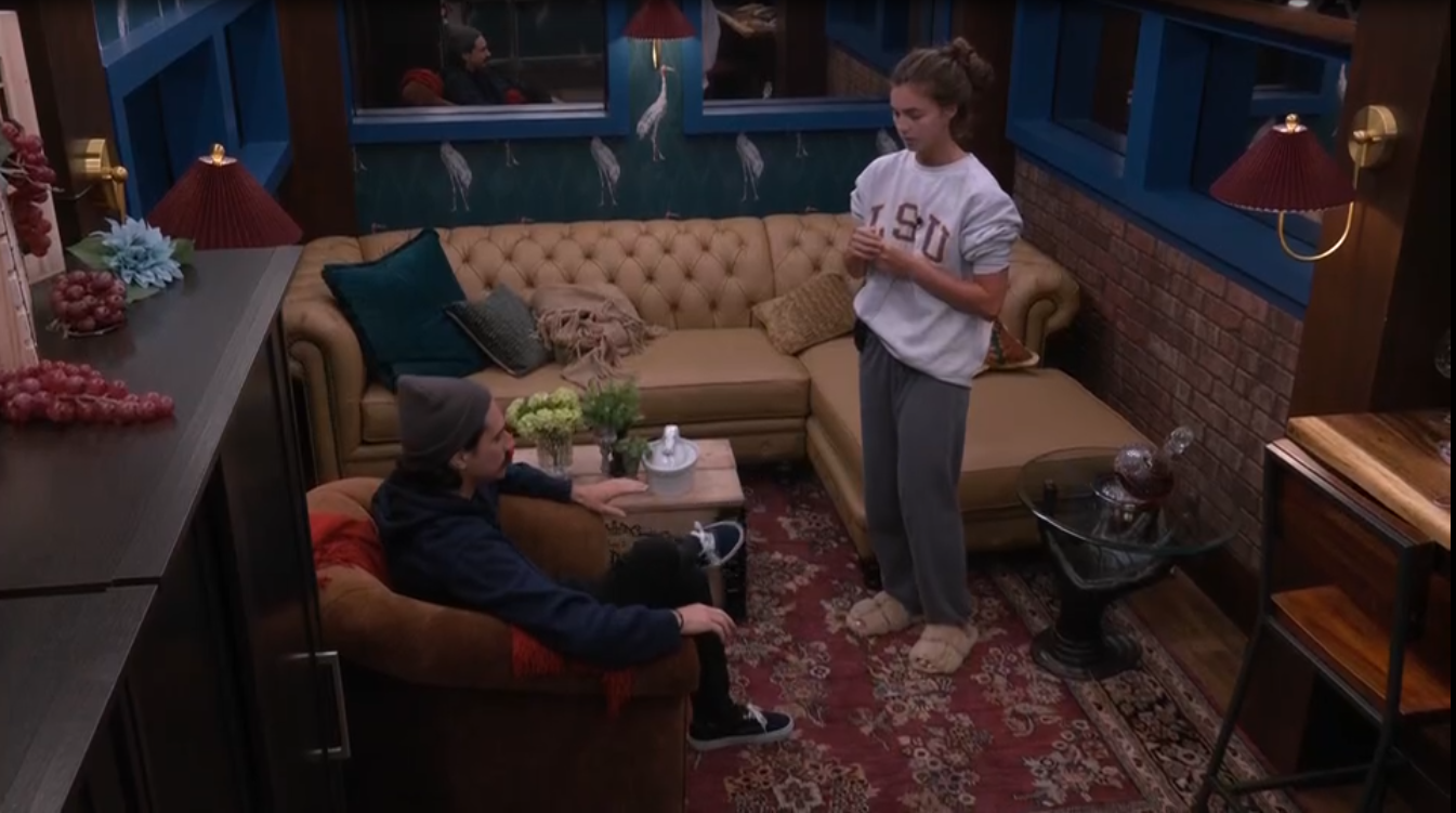 A beach at sunset with vibrant colors and calm waves.