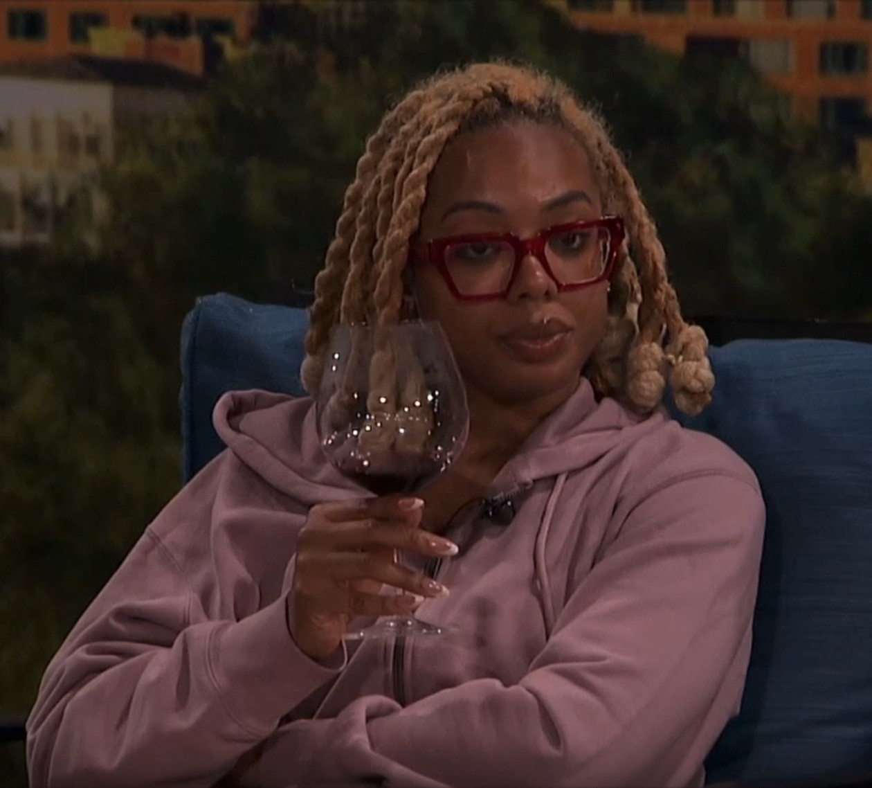 A beach at sunset with vibrant colors and calm waves.