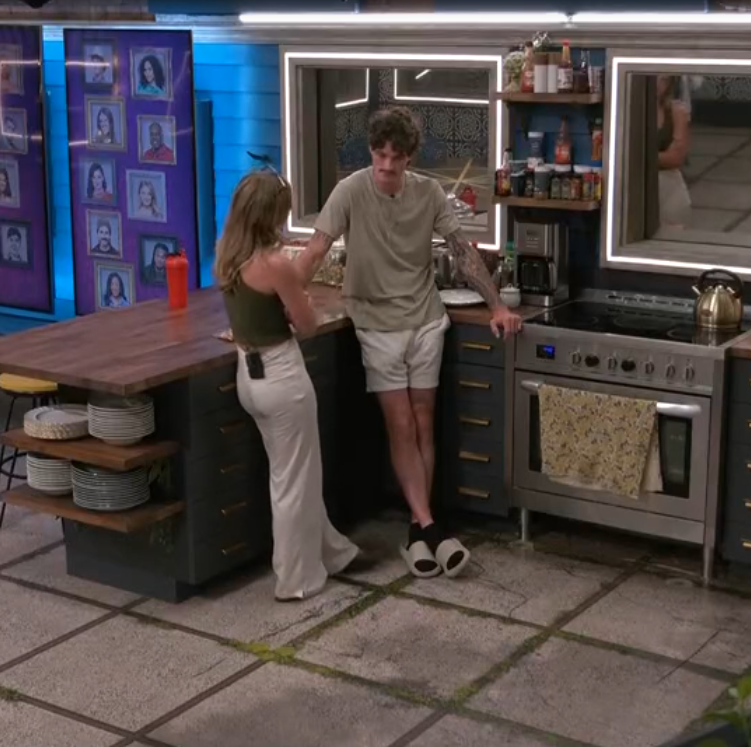 A beach at sunset with vibrant colors and calm waves.