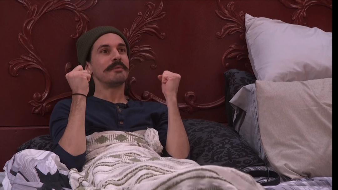 A beach at sunset with vibrant colors and calm waves.