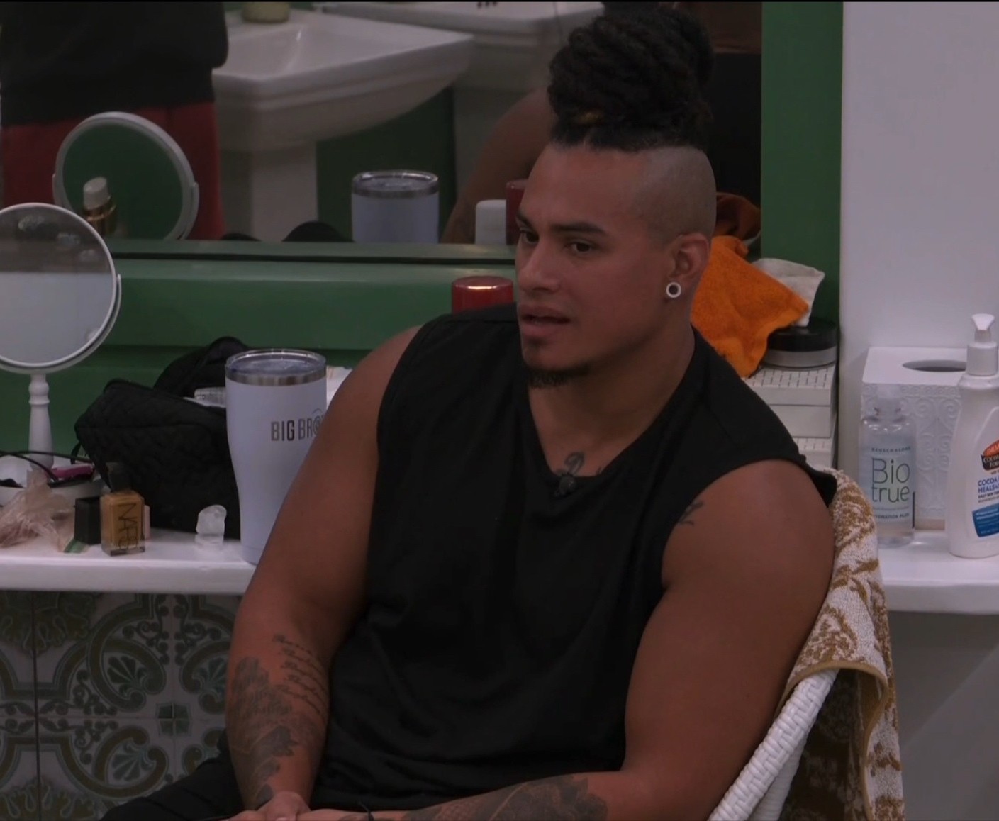 A beach at sunset with vibrant colors and calm waves.