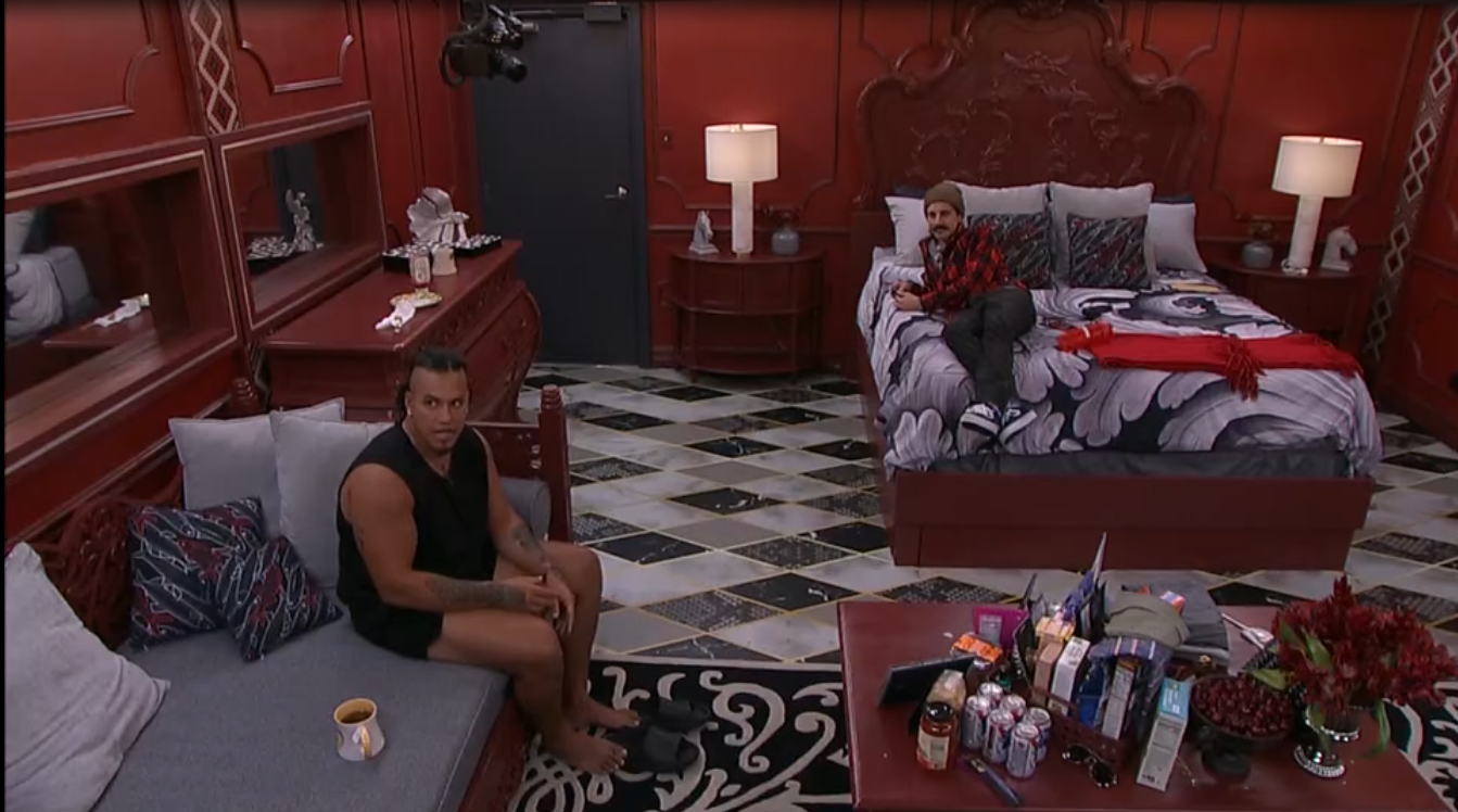 A beach at sunset with vibrant colors and calm waves.