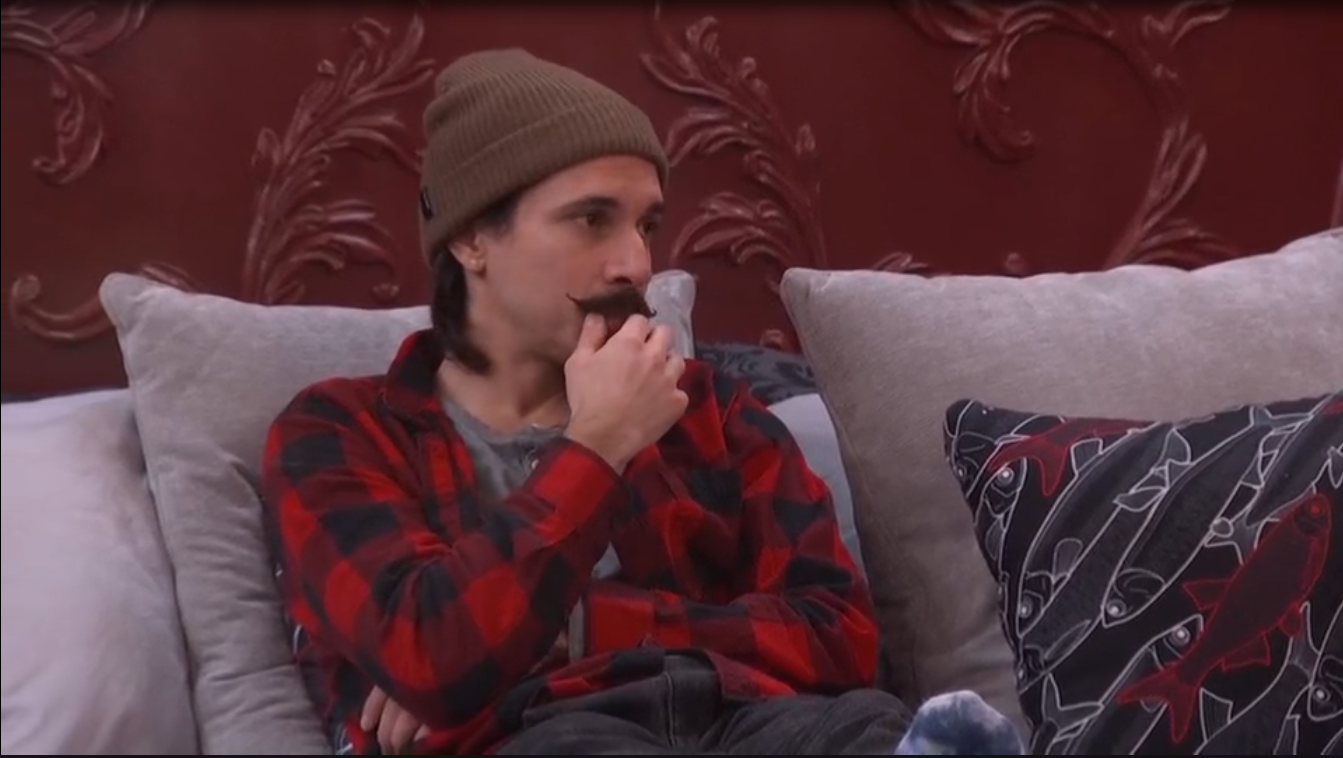 A beach at sunset with vibrant colors and calm waves.