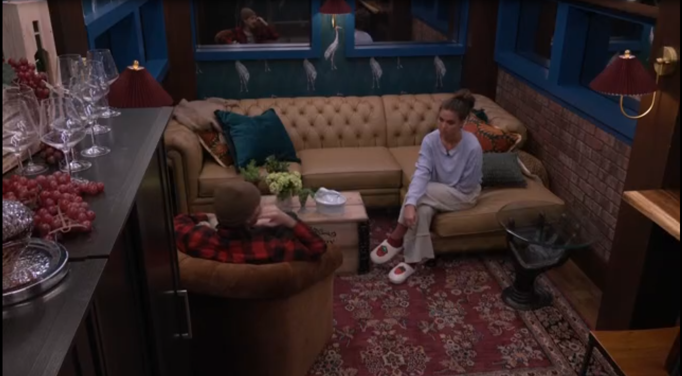 A beach at sunset with vibrant colors and calm waves.