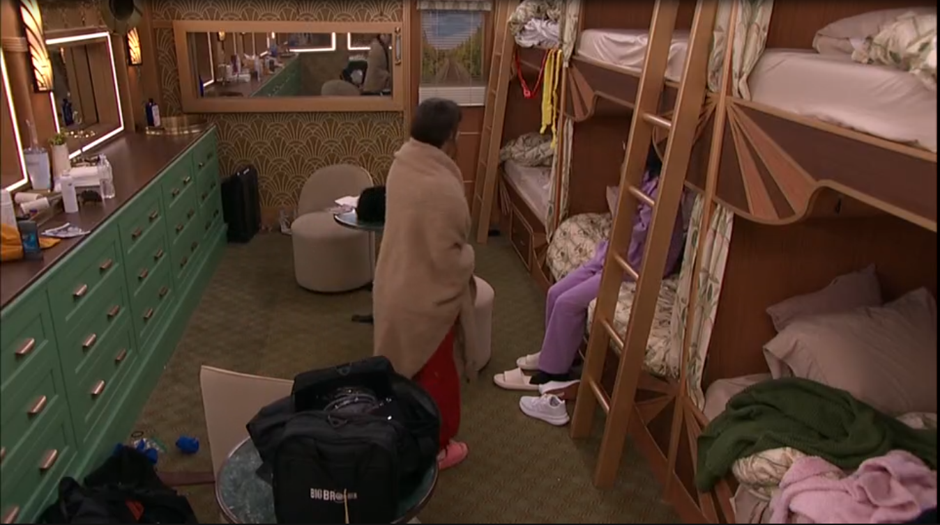 A beach at sunset with vibrant colors and calm waves.