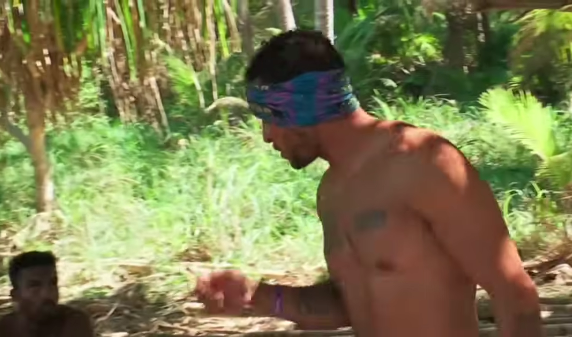 A beach at sunset with vibrant colors and calm waves.