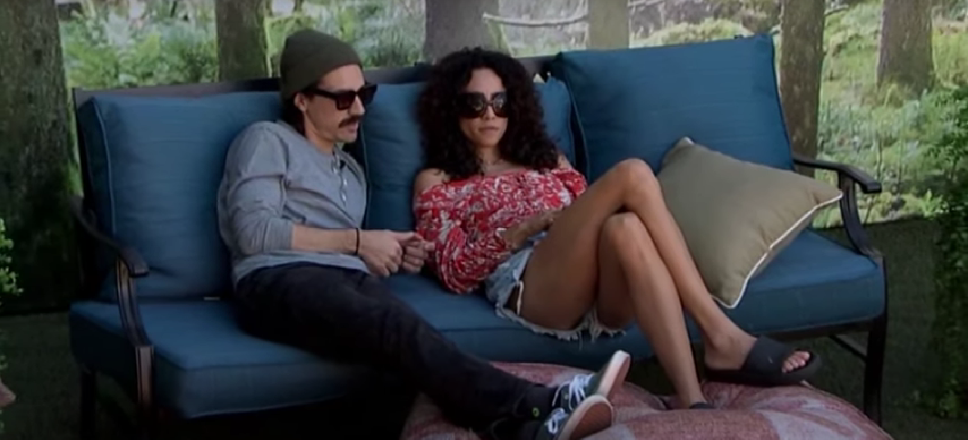 A beach at sunset with vibrant colors and calm waves.