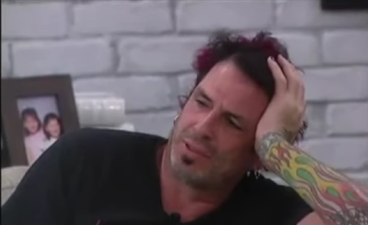 A beach at sunset with vibrant colors and calm waves.