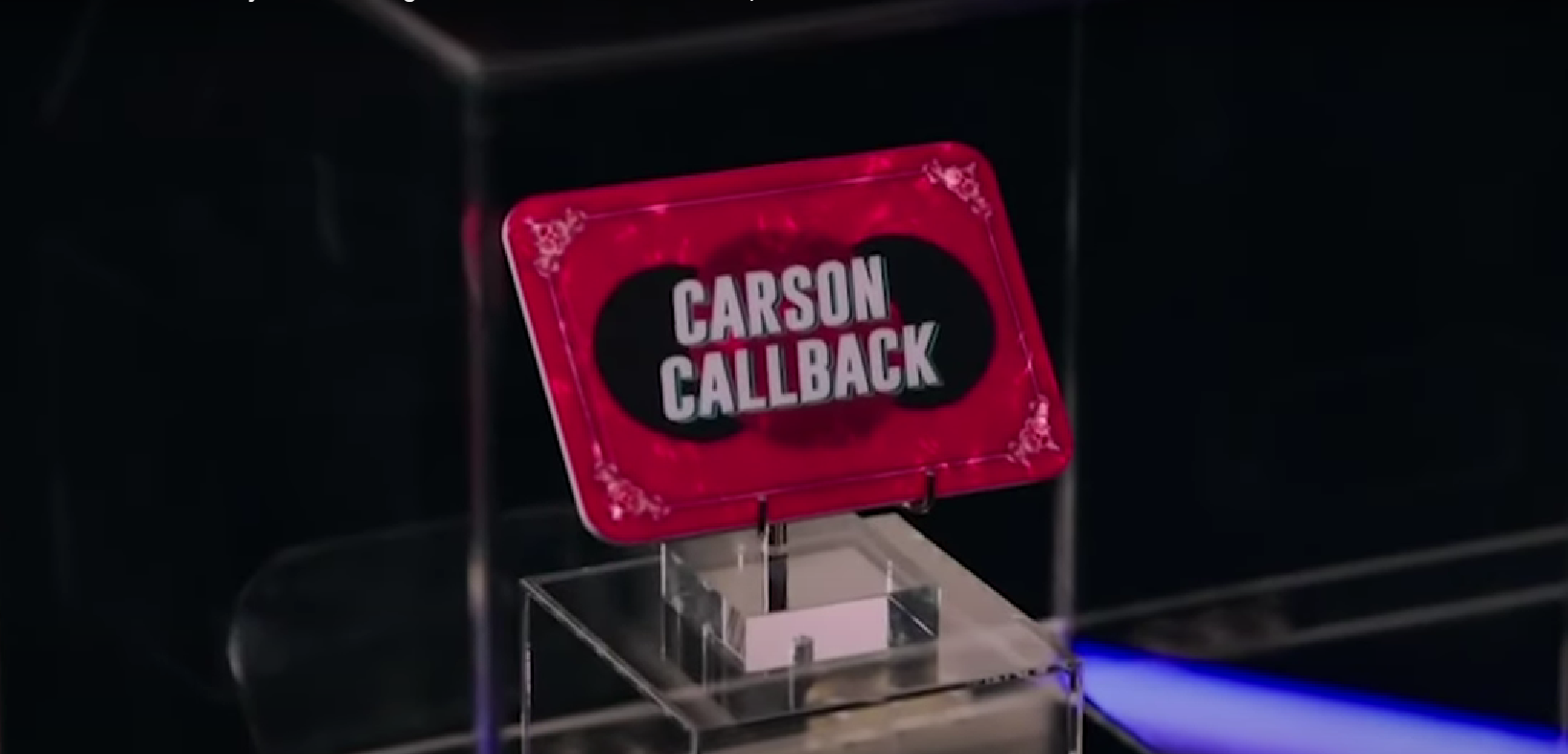 A beach at sunset with vibrant colors and calm waves.