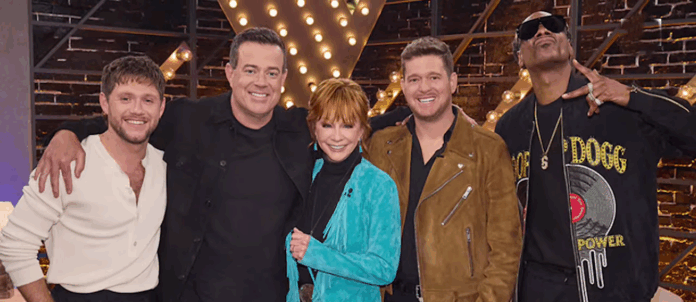 Three people smiling and posing indoors with warm lighting. Three people smiling and posing indoors with warm lighting.