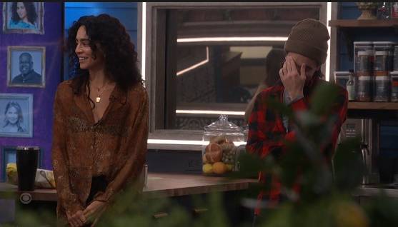 A beach at sunset with vibrant colors and calm waves.