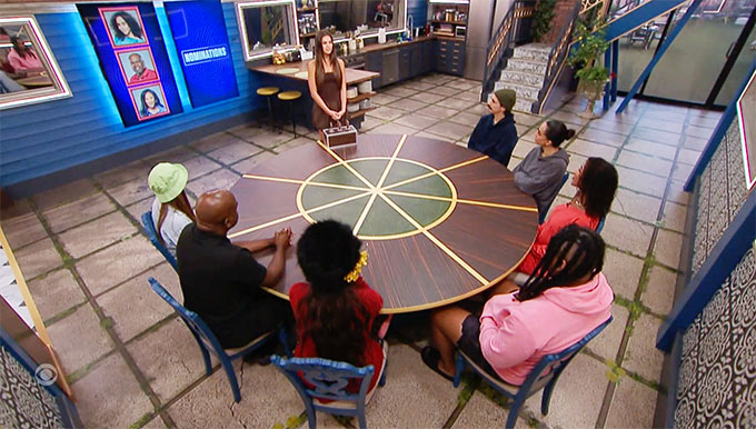 A beach at sunset with vibrant colors and calm waves.