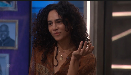 A beach at sunset with vibrant colors and calm waves.