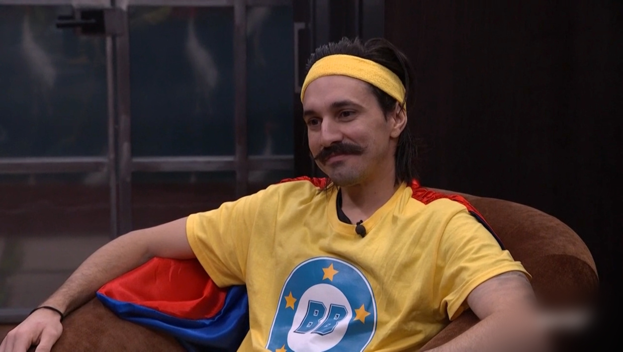 A beach at sunset with vibrant colors and calm waves.