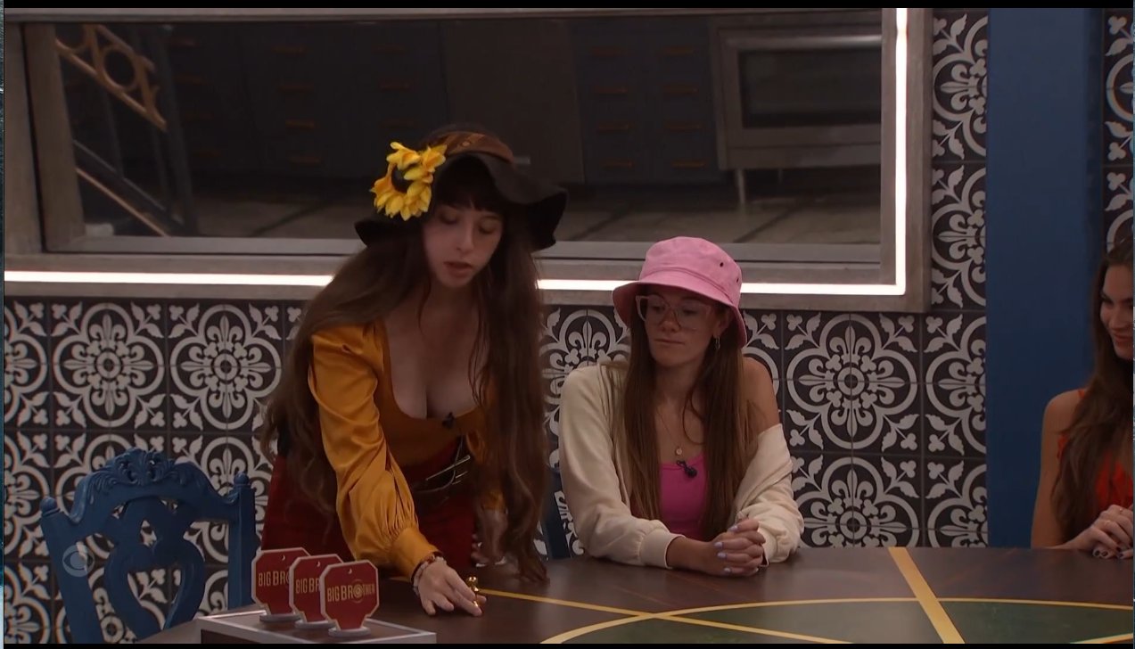 A beach at sunset with vibrant colors and calm waves.